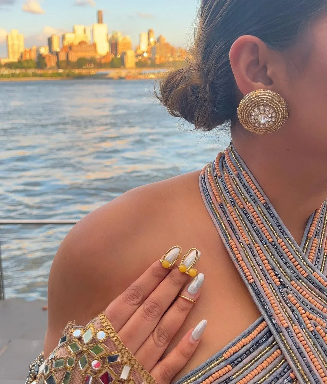 Rini Jain in Nirmooha's Halter Neck Hand-Embroidered Blouse with Cording detailing, Draped Chiffon Saree and Hand-Embroidered Belt  from Ancienne Collection