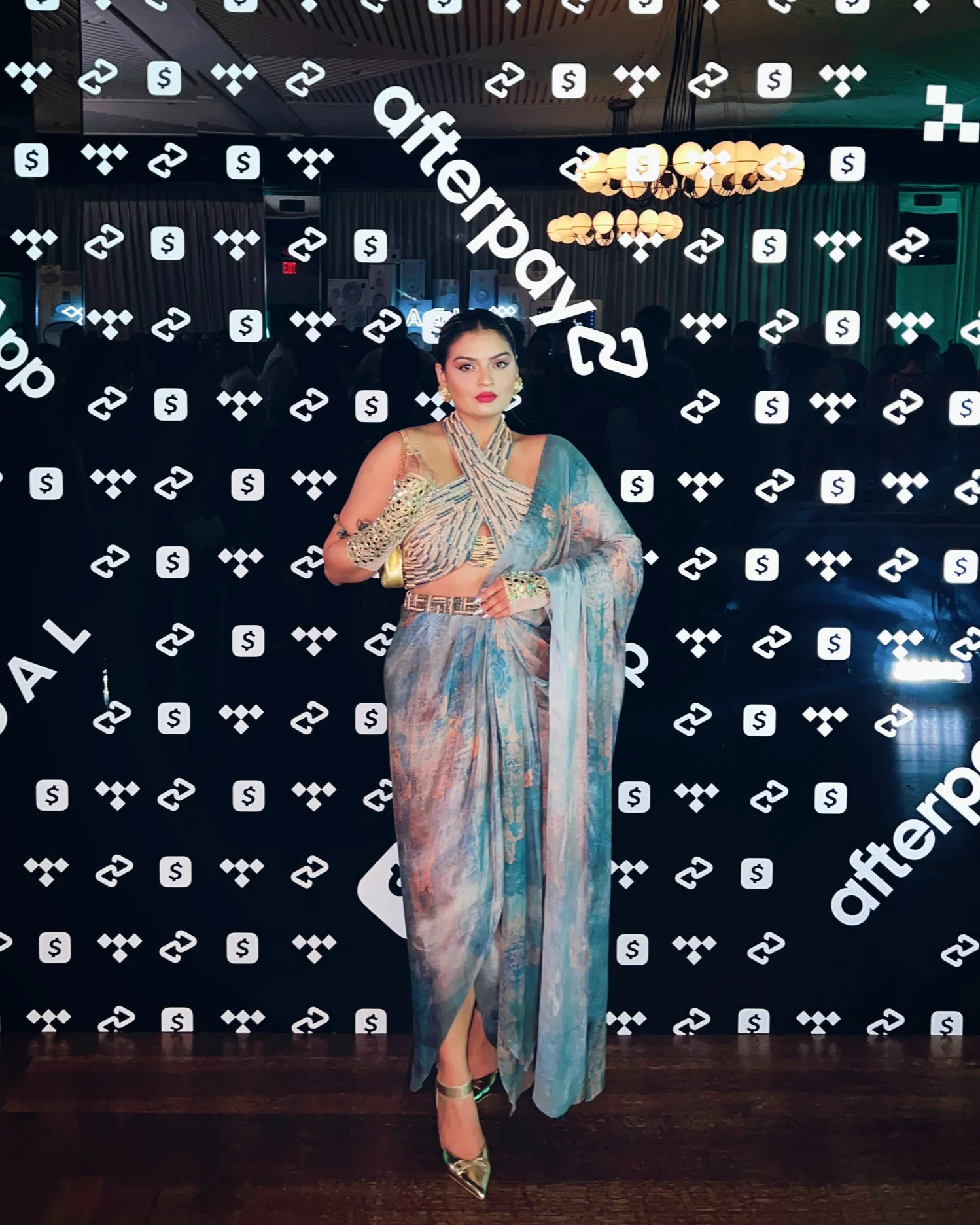 Rini Jain in Nirmooha's Halter Neck Hand-Embroidered Blouse with Cording detailing, Draped Chiffon Saree and Hand-Embroidered Belt  from Ancienne Collection