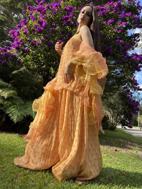 Sonali In our Hand-embroidered Printed Kurta, Printed Sharara with Double Layered Ruffled Dupatta from Retro- Spection Collection